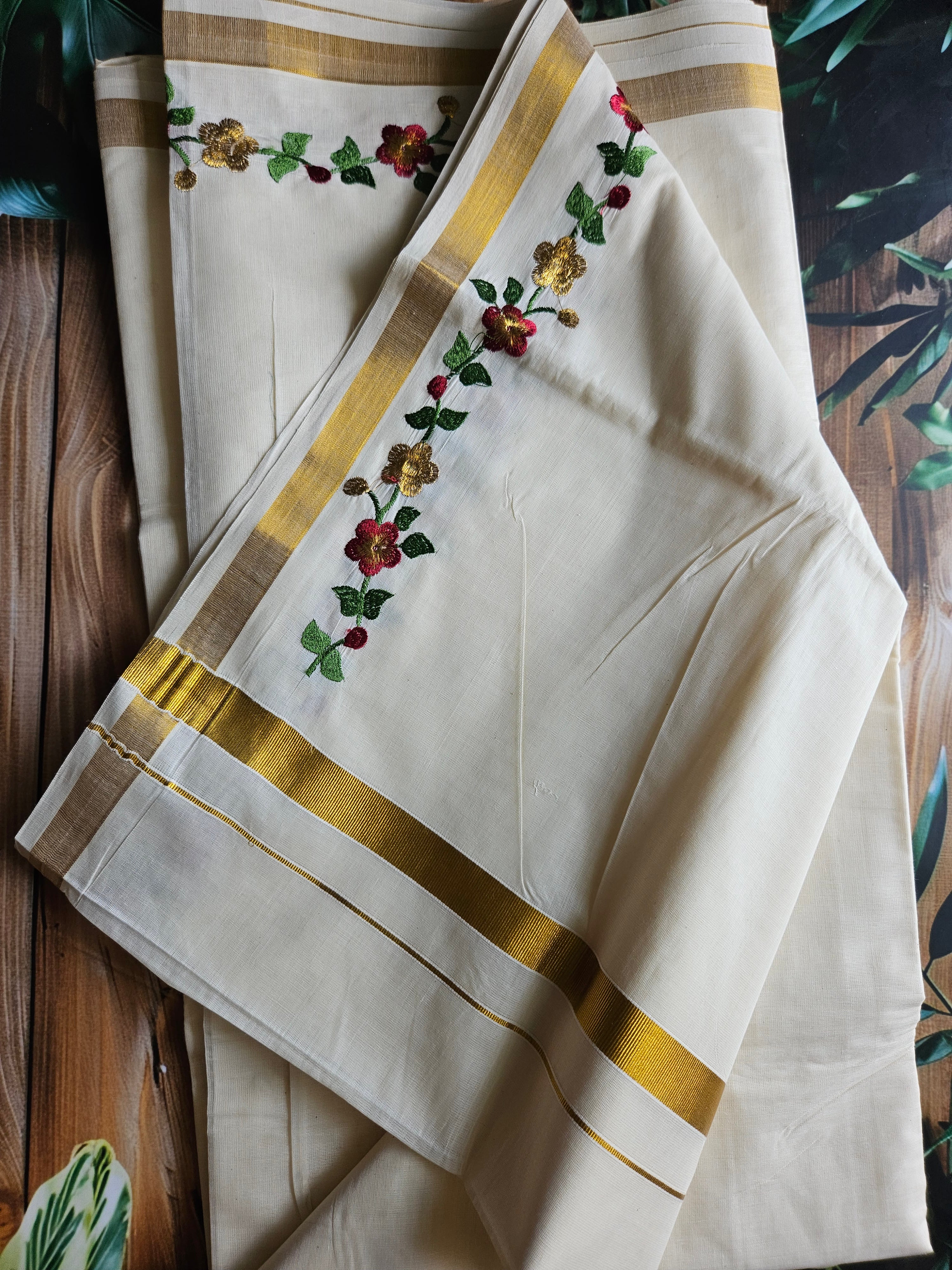 Flower embroidery Onam saree 